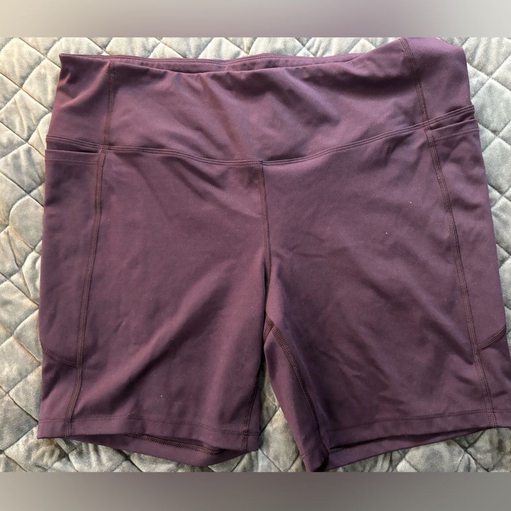 Purple spandex athletic shorts
